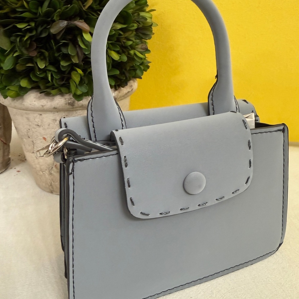 Elegant Soft Light Baby Blue Mini Handbag New without Tag